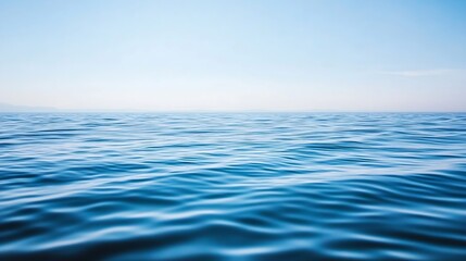 Aufkleber - Wide view of a serene blue ocean with gentle waves under a clear sky during the day : Generative AI