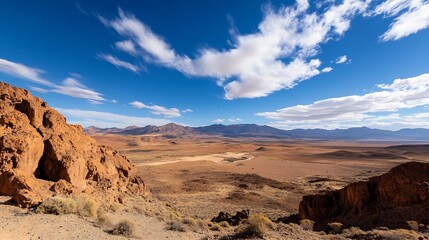 Poster - Dramatic Desert Landscape with Rocky Terrain and Expansive Blue Sky : Generative AI