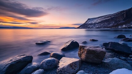 Poster - Tranquil Seascape at Sunset with Rocky Shoreline and Soft Waves Reflecting Evening Colors : Generative AI
