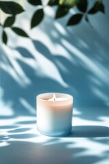Poster - soft candlelight casts delicate shadows in a serene setting with green leaves in the background duri