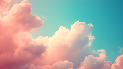 Poster - Soft hues of pink and blue blend seamlessly in the sky as majestic clouds float lazily, creating a peaceful atmosphere during the magical transition of dusk