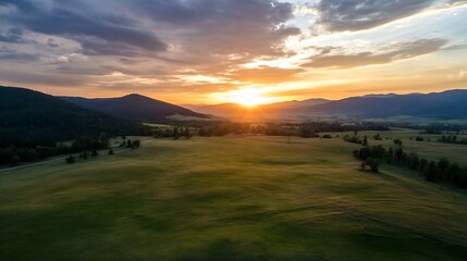 Wall Mural - Stunning Aerial View of Vibrant Sunset Over Rolling Hills and Open Fields : Generative AI