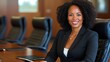 © MILKY_PS - Professional Businesswoman Portrait Empowering Leadership and Success in the Corporate World Explore this captivating image showcasing a confident and stylish African American woman in a sharp black