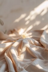 Poster - soft beige fabric drapes gracefully under warm sunlight in a serene indoor setting