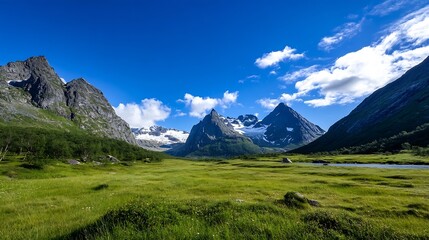 Canvas Print - Breathtaking panoramic view of majestic mountains under brilliant blue sky with lush green valley and scattered clouds : Generative AI