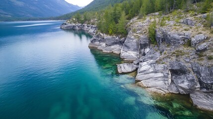 Canvas Print - Stunning Aerial View of Crystal Clear Water and Rocky Shoreline Under Bright Blue Sky : Generative AI