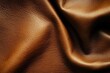 © Vooglo.com - A close-up of smooth brown leather with visible grain and natural folds. The lighting emphasizes