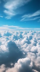 Aufkleber - Beneath the vast expanse of a bright blue sky, soft, fluffy clouds float serenely. The view captures the calmness of a high-altitude journey, inviting daydreams