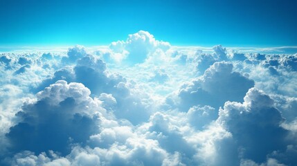 Poster - Soft, fluffy clouds stretch across the sky, illuminated by the warm afternoon sun. The vast expanse of blue creates a tranquil atmosphere, inviting daydreams and reflection