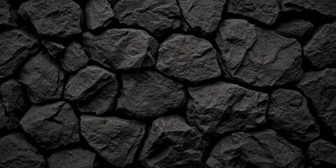 Poster - A close-up image of textured black rocks, creating a visually striking and uniform surface that emphasizes natural beauty and contrast.