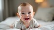 © Oleksandr Butenko - photograph of a cute, smiling baby boy with a happy expression