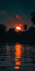 Poster - Tropical Paradise at Sunset Palm Trees Silhouetted Against Vibrant Orange Sky with Water Reflection