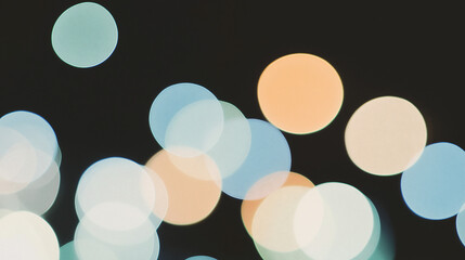 Poster - Bokeh Lights: A mesmerizing display of out-of-focus, or bokeh, lights floats against a dark backdrop, evoking feelings of mystery and dreamlike beauty. The soft.