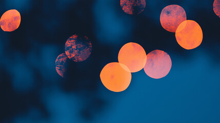Poster - Festive Lights Abstract: A captivating abstract composition showcasing a bokeh of vibrant orange lights set against a deep blue backdrop, evokes a sense of warmth.