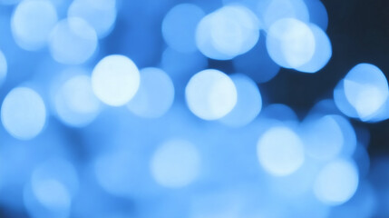 Poster - Abstract Blue Bokeh: A mesmerizing display of soft, circular lights creates an ethereal and dreamlike ambiance, perfect for conveying feelings of tranquility, celebration, or wonder. 