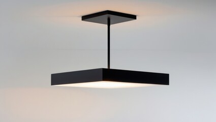 Wall Mural - Sleek Black Square Ceiling Lamp with Modern Geometric Design Hanging in Bright Interior Lighting