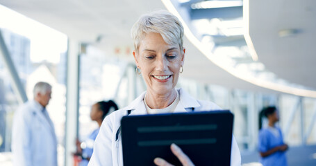 Poster - Healthcare, tablet and senior woman doctor smile in a lobby with research, planning or email. Digital, app and elderly female nurse online in hospital for Telehealth, social media or reading feedback