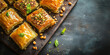© Yuliya - Vibrant image of Turkish baklava with peanut on rustic surface