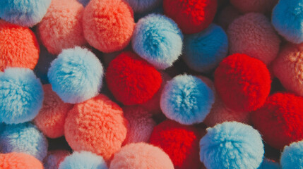 Poster - Colorful knitted fabric background with soft pom poms for creative design