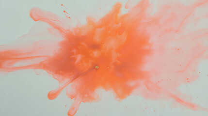 Poster - Vibrant orange ink blot on gray background for artistic design concepts