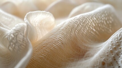 A close up photograph of textured flowing fabric material