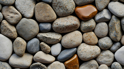 Fototapete - a collection of smooth, colorful river rocks. The image showcases a range of colors and textures, creating a visually interesting and abstract background.  