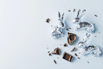 Poster - Editorial-style arrangement displaying unwrapped foil pieces alongside partially eaten chocolate