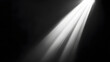 © Ondrej - A beam of white light shines on the black background