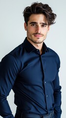 Poster - A man in a blue shirt is smiling and posing for a picture