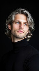 Poster - A man with a long gray hair and a blue eye is wearing a black shirt