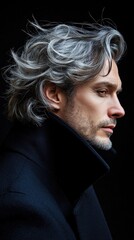Poster - A man with gray hair and a beard is wearing a black coat