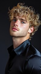Poster - A man with blonde hair and a beard is wearing a black shirt