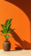 Poster - Botanical arrangement in a clay pot vibrant orange wall interior modern aesthetic close-up view nature inspired