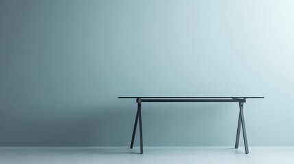 Wall Mural - Minimalist desk stands against a pale blue wall, in empty room, bathed in soft light