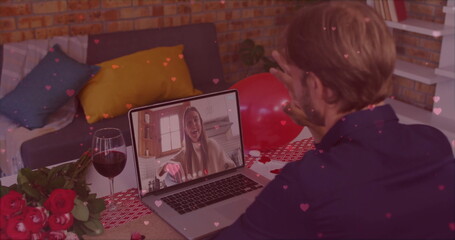 Poster - Image of hearts falling over caucasian man having image call with caucasian woman