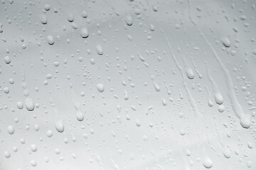 Sticker - Water drops on light glass surface, closeup