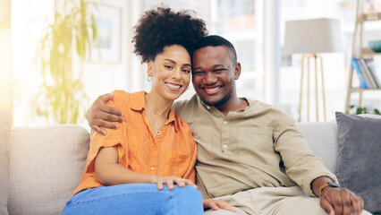 Poster - Portrait, love and happy couple hug, relax and bonding together on living room sofa with care, support and trust. Happiness, home and black man, woman or marriage people romance, smile and embrace