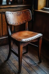 Poster - A wooden chair sitting on a hardwood floor, simple and minimalist design