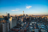 A panoramic view from a high altitude in the city of Beijing, China, showcases numerous tall buildings