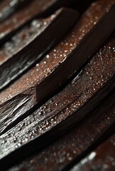 Poster - Close-Up of Dark, Gleaming Wood Surfaces with Smooth Curves and Textured Grain in Artistic Arrangement for Creative Use