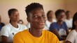 © Elena - Student smiling during a classroom activity in a vibrant learning environment filled with peers