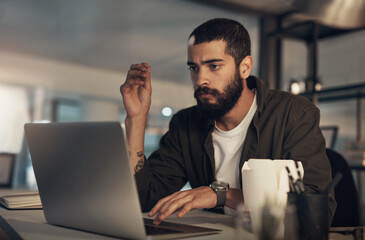 Poster - Creative, man and annoyed with laptop at desk in office for overtime, deadline or mistake. Thinking, planning and problem solving with design employee with late night, burnout and 404 error or glitch
