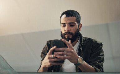 Business, man and typing with phone in office for reading email, schedule update and report feedback. Below, male publisher and mobile of article negotiation, project information and publishing forum
