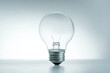 © Anjali - A clear light bulb stands on a surface, symbolizing ideas, innovation, and brilliance.