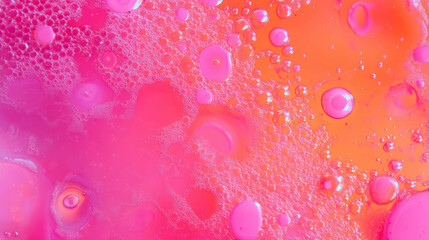 Poster - Vibrant abstract background with pink and orange ink bubbles and dots for creative design