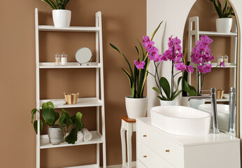 Wall Mural - Interior of bathroom with sink, mirror and orchid flower