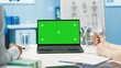 © DC Studio - Doctor consulting a male patient in medical facility next to green screen, using modern technology for scan interpretation and diagnostics. Medic gives professional advice based on illness. Camera A.