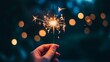 © Kelly - Isolated hand holding a sparkler, a warm glow generative ai