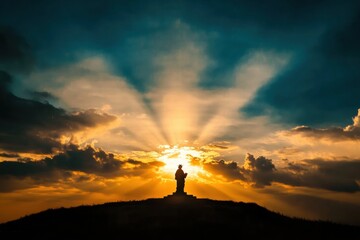 Aufkleber - Stunning sunset illuminating a statue atop a hill with dramatic clouds in the background. Generative AI