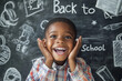 © lashkhidzetim - young boy is smiling and holding his hands up in front of a chalkboard with the words 'Back to School' written on it